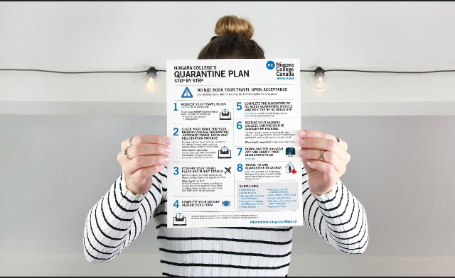 A person whose face is hidden by a sheet of paper holds up NC's Quarantine plan listing the eight steps of the process. 