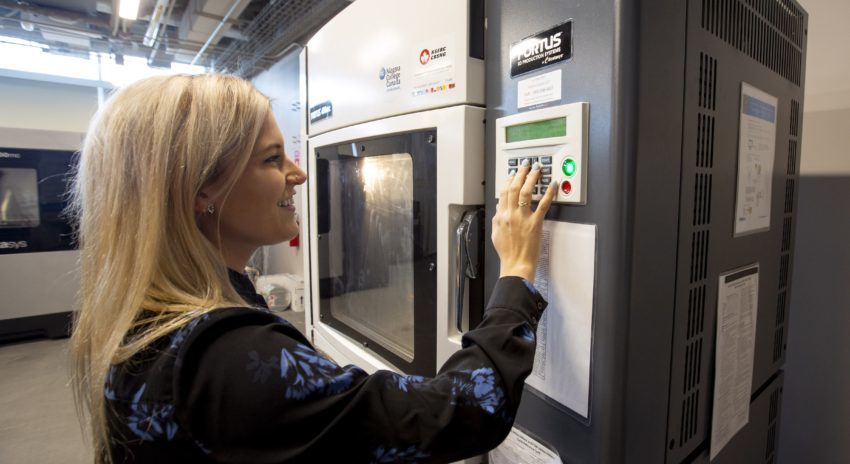 Woman touching control panel